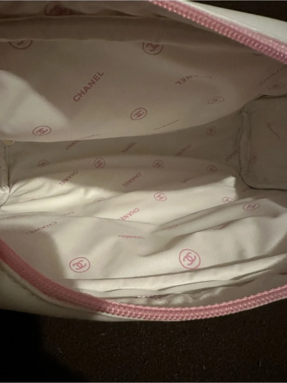 CHANEL White Cosmetic Pouch with Pink Trim. 9.25”W x 7”H.